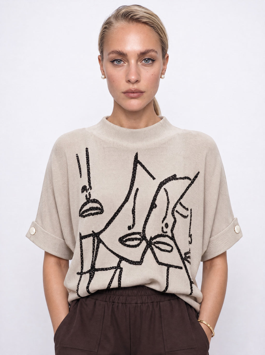 ABSTRACT FACE PRINT DOLMAN KNIT