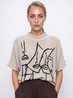 ABSTRACT FACE PRINT DOLMAN KNIT