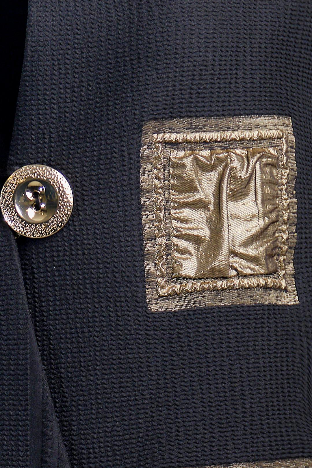 BLACK JACKET WITH METALLIC PATCH DETAIL