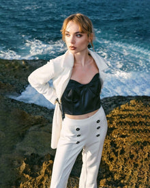 DOUBLE-BUTTON FLARED TROUSERS