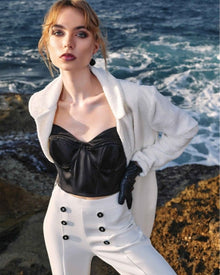 DOUBLE-BUTTON FLARED TROUSERS