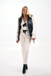 WHITE CARDIGAN WITH BLACK BOWS