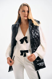 WHITE CARDIGAN WITH BLACK BOWS