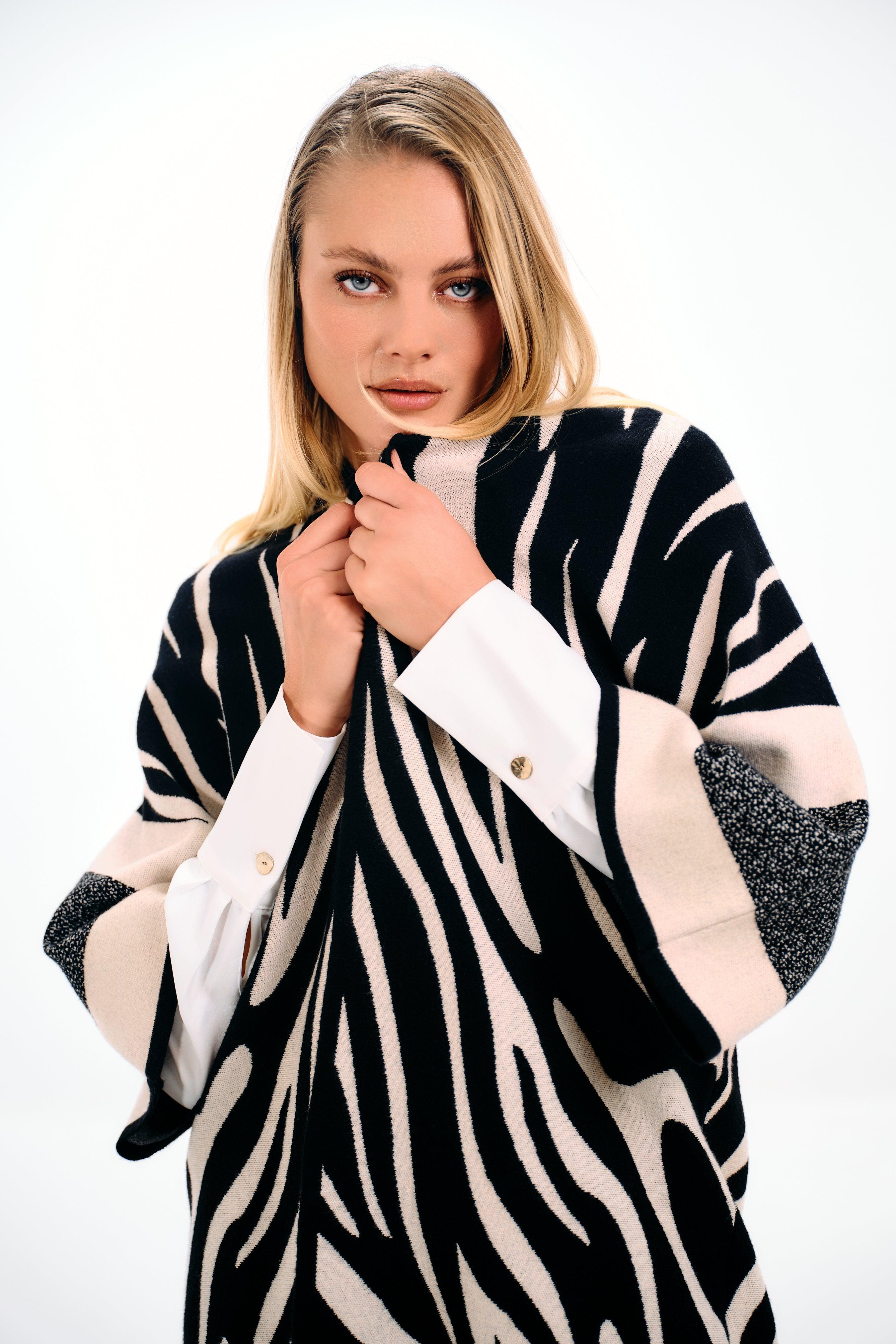 ZEBRA PRINT FRINGED CAPE