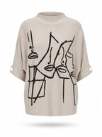 ABSTRACT FACE PRINT DOLMAN KNIT