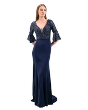 SEQUINED ILLUSION EVENING GOWN